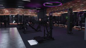 Freihantelbereich im EASYFITNESS Soest mit Hantelbänken, Trainingsgeräten und violetter Beleuchtung
